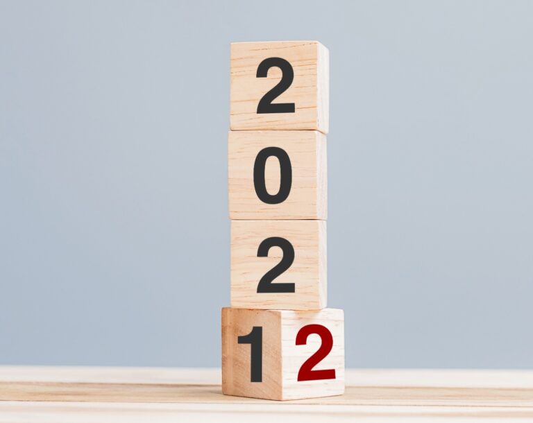 2022 wooden cube blocks on table background. Resolution, plan, review, goal, start and New Year holiday concepts
